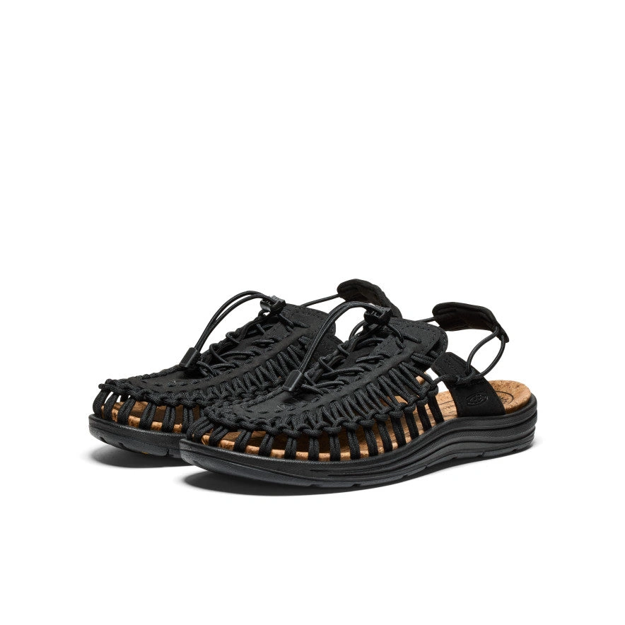 UNEEK II Convertibles: Musta kuin yö, muuntuva kuin mieli. Unisex-saappaat, vapaus jalkoihin.